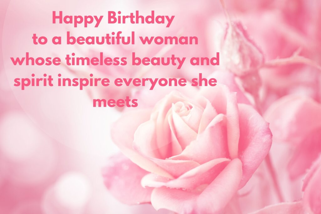 Close-up of a blooming pink rose covered with delicate water droplets, surrounded by blurred rosebuds and petals in soft pink tones. The composition creates a dreamy, romantic background suitable for birthday greetings and celebrations.